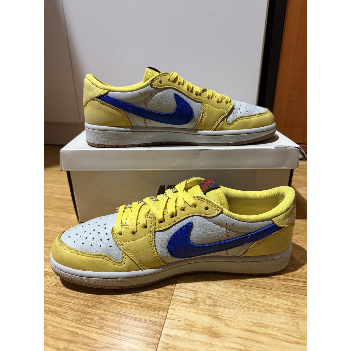 Travis Scott Jordan 1 Low Canary